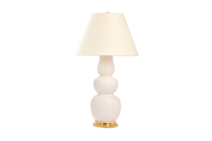 Allen lamp in matte white glaze with 23k gold base, brass double socket cluster, and off white vellum paper shade, on a white background.