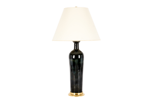Large Anthony lamp in alligator green glaze with 23k gold base, brass double socket cluster, and off white vellum paper shade, on a white background.