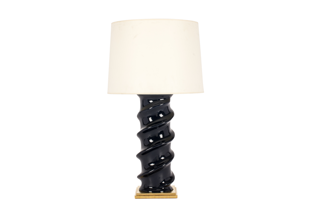 Amanda lamp in indigo glaze with 23k gold base, brass double socket cluster, and off white vellum paper shade, on a white background.