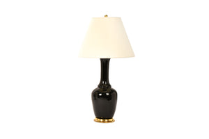 Single Alex table lamp in Jet Black glaze with 23k gold base and brass double socket cluster and off white paper vellum shade.