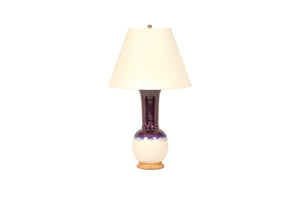 Alexandra lamp in plum ombre glaze, oak base, brass double socket cluster, and off white paper vellum lampshade, on a white background.