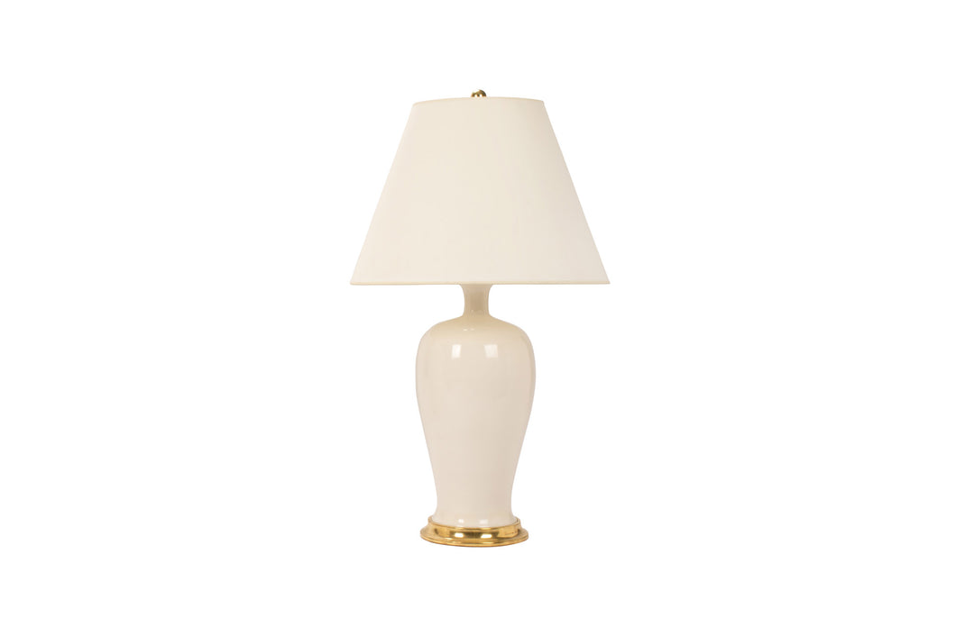 Amy lamp in white blanc de chine glaze with 23k gold base, brass double socket cluster, and off white vellum paper shade, on a white background.