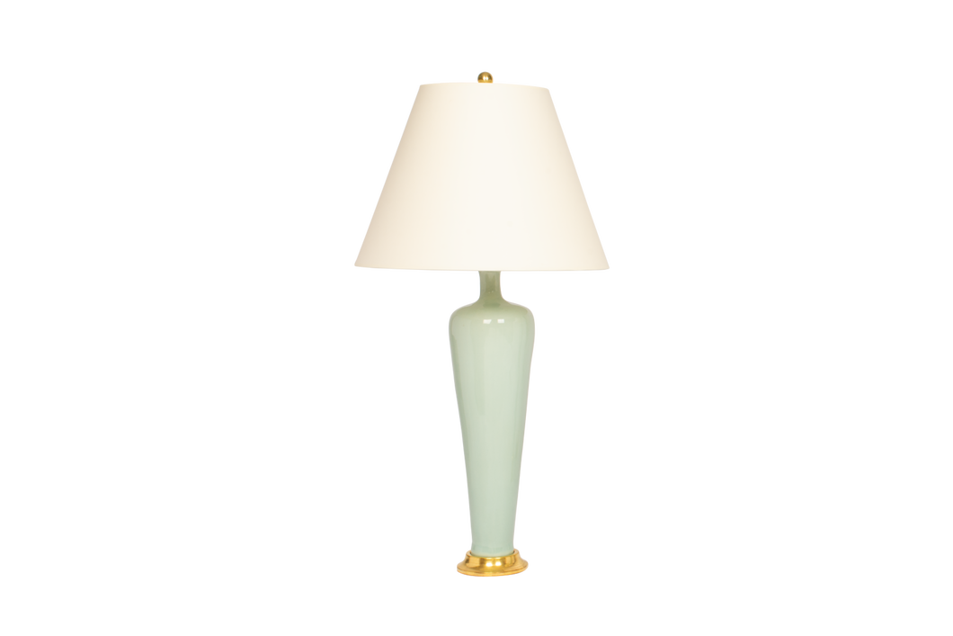 Medium Anthony lamp in duck egg glaze with 23k gold base, brass double socket cluster, and off white vellum paper shade, on a white background.