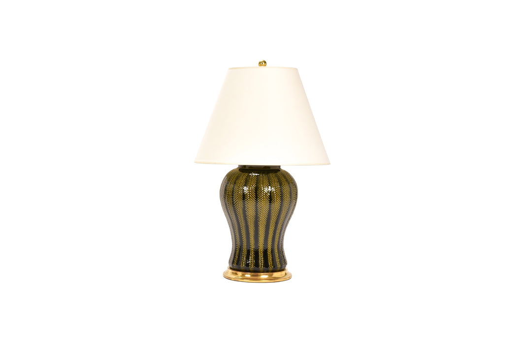 Single Douglas Table Lamp with Hand Slip Trailed Chevron Detail, in Olive Glaze with 23k gold water gilt base, brass double socket cluster, and off white vellum paper shade, on a white background.