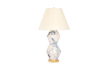 Large David lamp in Delft Blue Marble glaze with 23k gold base, brass double socket cluster, and off white vellum paper shade, on a white background.