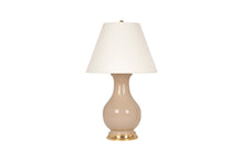 A single Large Hann table lamp in Warm Beige glaze with a 23k gold base, brass double socket cluster, and off white vellum paper lampshade, on a white background.